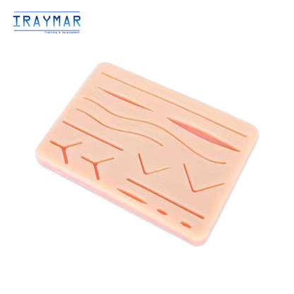 Almohadilla para práctica de sutura